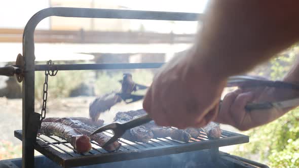 Man Having Barbecue Party, Outdoors