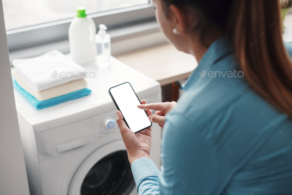 Woman using smart devices at home