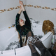 Happy young woman in evening dress sitting in the bathtub drinking champagne and having fun. - PhotoDune Item for Sale