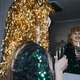 Beautiful woman with holiday makeup and gold shiny foil wig holding glass of champagne. - PhotoDune Item for Sale