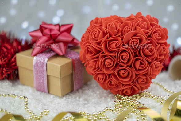 big heart shaped souvenir of roses with surprise gift box