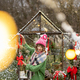 Woman decorates glasshouse for a winter holidays - PhotoDune Item for Sale