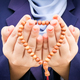 Close up hands woman praying against white background. - PhotoDune Item for Sale