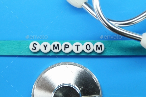 stethoscope with the word symptom. - Stock Photo - Images