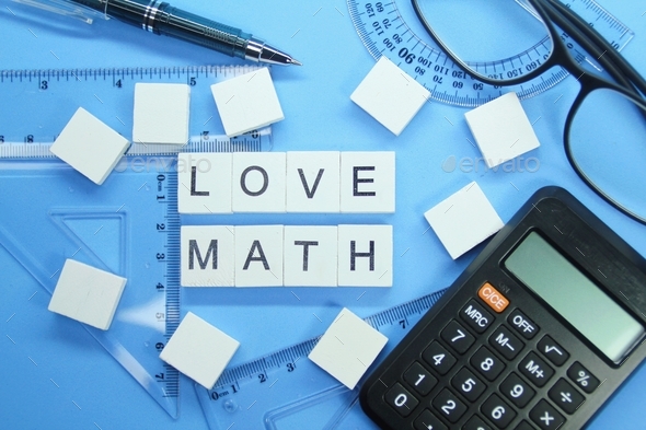 calculator and ruler with the words LOVE MATH.  - Stock Photo - Images