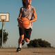 Active boy playing with basketball on court - PhotoDune Item for Sale