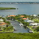 Aerial view of residential suburbs with private homes located near wildlife wetlands - PhotoDune Item for Sale
