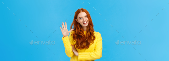 Cheerful, charismatic friendly redhead female showing high five, number fifth as making order