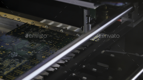 Electronic circuit board close up. Media. Process of creating an electronic chip. Automatic