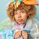 Vertical shot of shocked displeased adult woman with curly hair covered with plastic garbage worried - PhotoDune Item for Sale