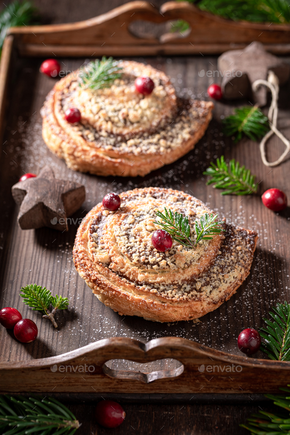 Homemade and hot cinnamon yeast made of butter and cinnamon. Stock Photo by Shaiith