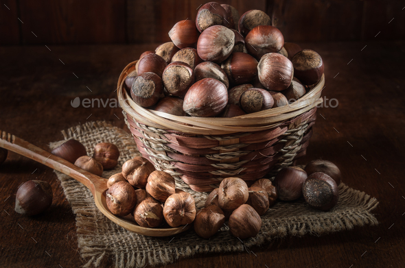 hazelnuts in a basket - Stock Photo - Images