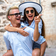 Romantic tourist couple in love enjoying summer vacation. People travel fun concept - PhotoDune Item for Sale