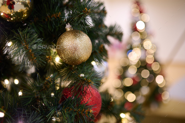 Christmas tree with gold decoration in shopping mall. Stock Photo by ...