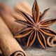 Star anise and cinnamon sticks close-up on a wooden background. - PhotoDune Item for Sale