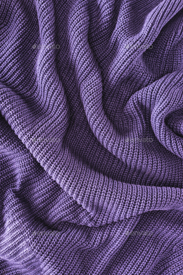 full frame of purple folded woolen fabric as background - Stock Photo - Images