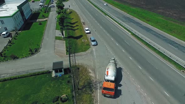 Construction With Concrete Mixer Truck, Aerial view of heavy concrete truck on construction site alt