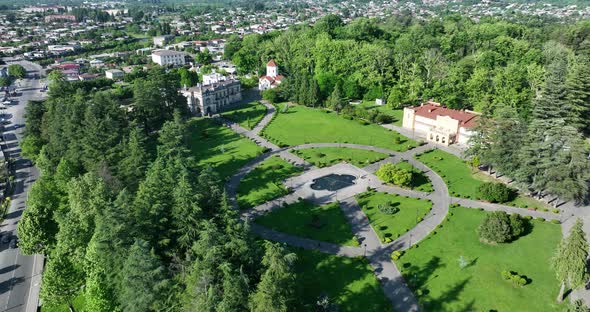 Zugdidi, Georgia - May 30 2022: Aerial view of Dadiani Palace in the center of Zugdidi city alt