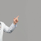 Cheerful mature chinese man therapist in white coat and glasses pointing fingers at copy space - PhotoDune Item for Sale