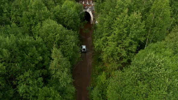 Aerial View of the Car Entering the Tunnel alt