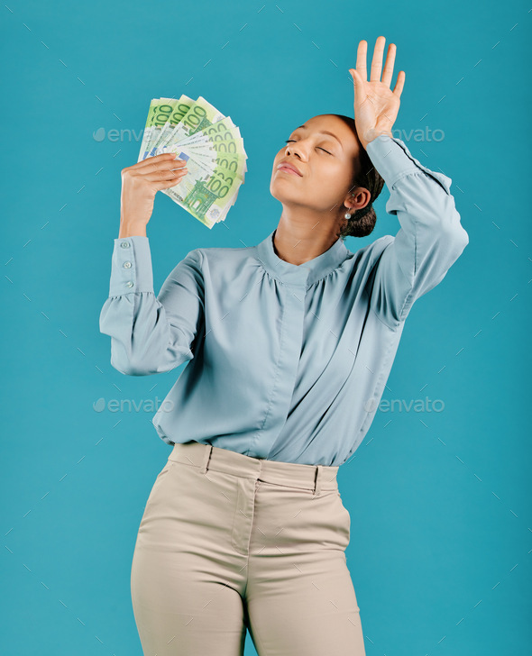 Woman showing off money, looking rich with cash prize and winning the lottery while standing agains