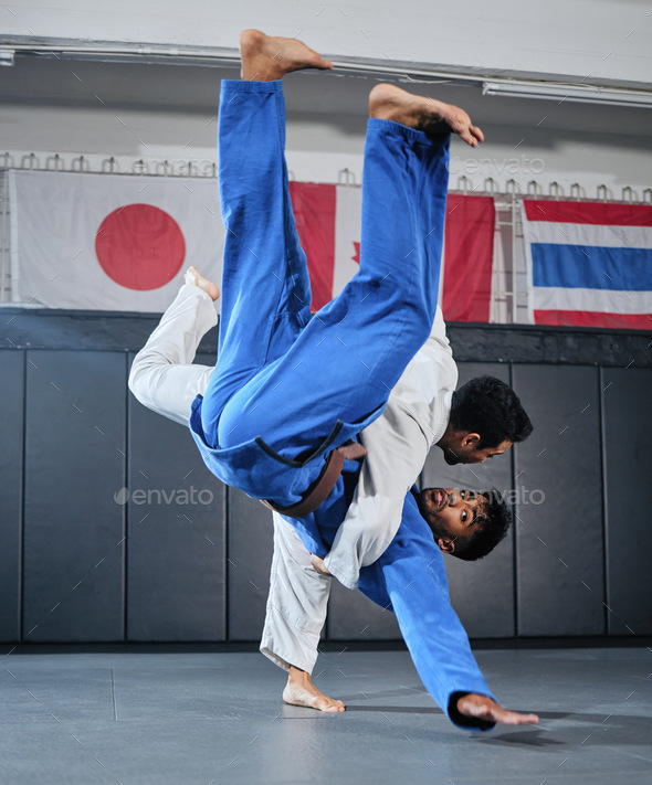 Health, fitness and motivation, men in karate fight for a winner in a dojo. Martial arts, a learnin
