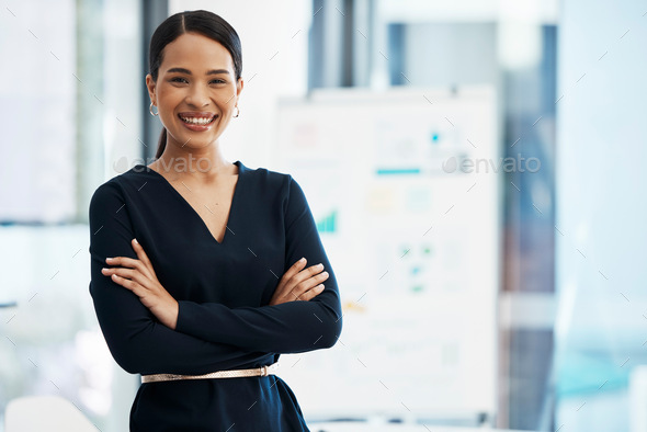 Confident, happy and smiling business woman standing with her arms ...