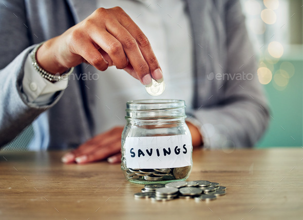Savings jar, money coins and change of a woman hand holding and saving cash to budget. A female pla