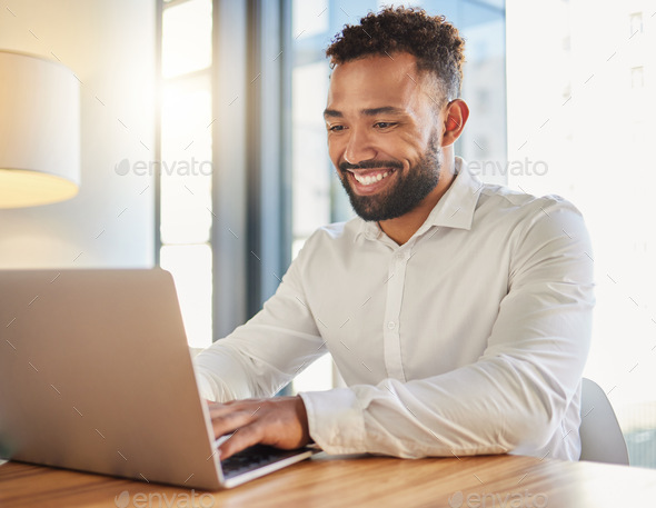 Happy business manager on laptop working on email announcement for success or project management st - Stock Photo - Images