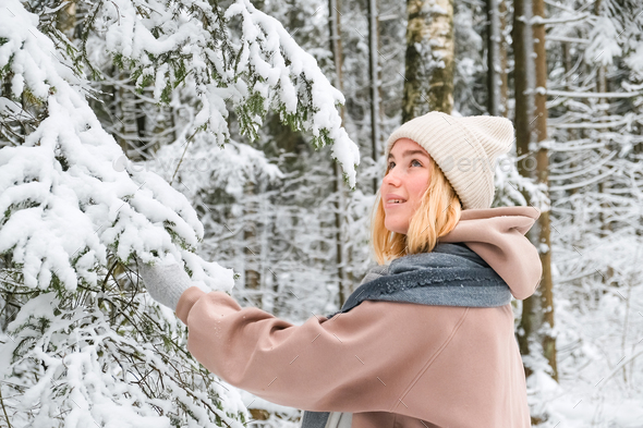 Winter.woman walks through winter snowy forest. Mental and physical health. Unity with nature.travel - Stock Photo - Images