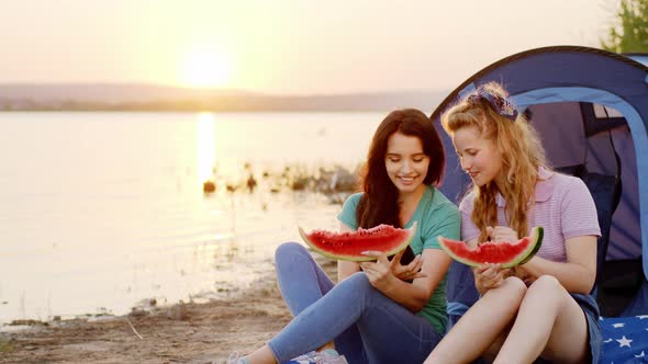 Charismatic Young Women Friends Beside the Lake at alt