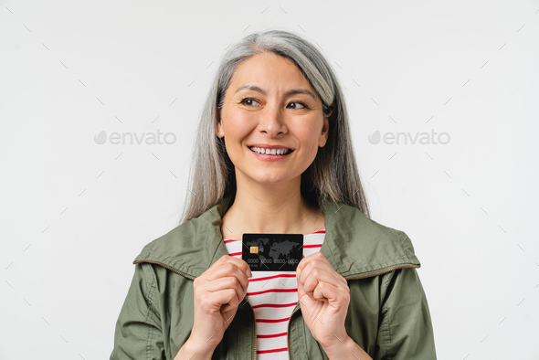 Dreamy thoughtful caucasian mature middle-aged woman client - Stock Photo - Images