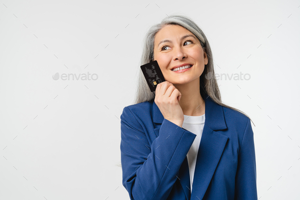 Dreamy thoughtful caucasian mature middle-aged bank  - Stock Photo - Images