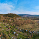 Mountain village among green fields, aerial view. - PhotoDune Item for Sale
