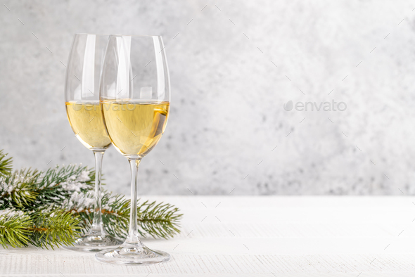 Christmas fir tree branches and champagne - Stock Photo - Images