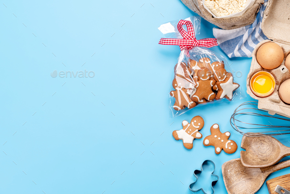 Cooking gingerbread man cookies for Christmas - Stock Photo - Images