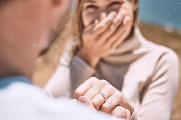 Engagement, proposing and romance wth a man asking his fiance to marry him while dating and spendin