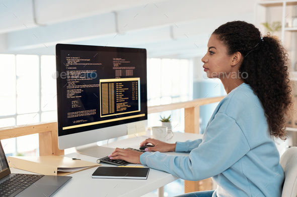 Software Developer Working on Computer - Stock Photo - Images