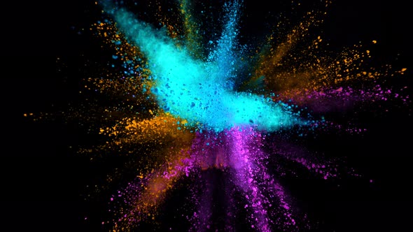 Super Slowmotion Shot of Color Powder Explosions Isolated on Black Background alt