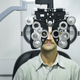 Man having eye test using phoropter. - PhotoDune Item for Sale