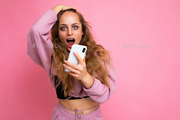 Photo of attractive crazy amazed surprised young woman wearing casual stylish clothes standing