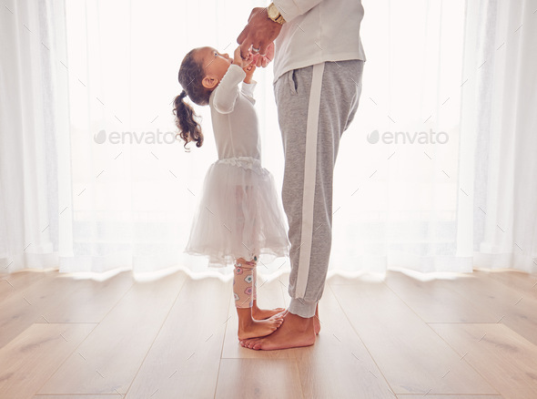 Family, dance and daughter on dad feet together on floor of interior for happiness, childhood and b