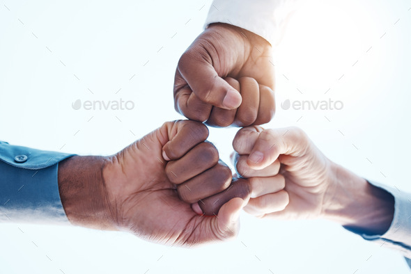 Fist bump, group support and team success in meeting at work, celebration of corporate win and team - Stock Photo - Images