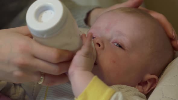 Baby Eats From The Bottle alt