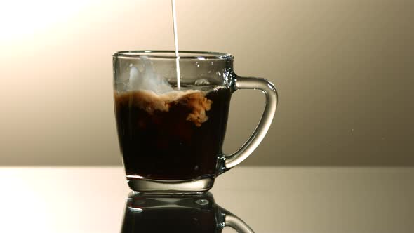 Milk poured into coffee in ultra slow motion 1500fps - COFFEE w MILK alt