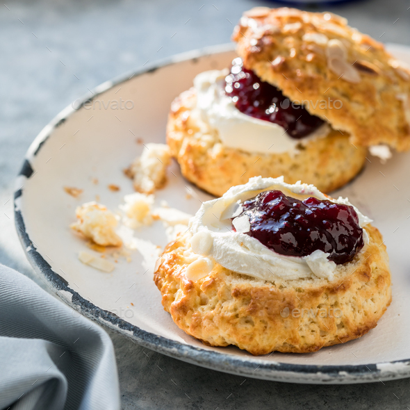 Traditional British Scones With Clotted Cream Raspberry Jam Stock