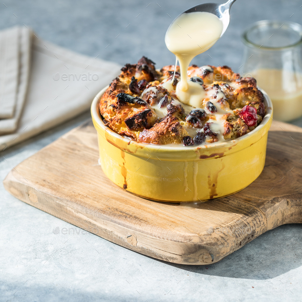 Bread pudding. Traditional English breakfast casserole with apples and