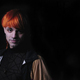 Boy with orange hair on the black background. - PhotoDune Item for Sale