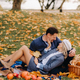 Happy couple enjoying golden autumn spring season in the park - PhotoDune Item for Sale