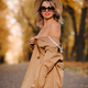 Sexy girl in a coat and hat in an autumn sunny park - PhotoDune Item for Sale